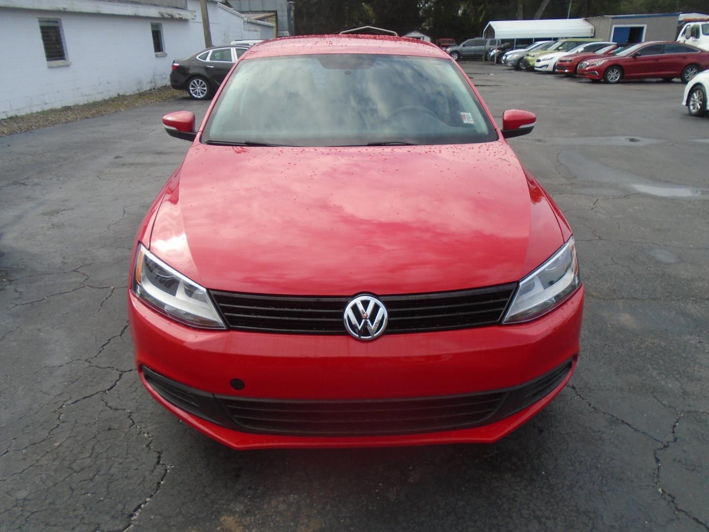 2012 RED Volkswagen Jetta SE (3VWDP7AJXCM) with an 2.5L L5 DOHC 20V engine, located at 6112 N Florida Avenue, Tampa, FL, 33604, (888) 521-5131, 27.954929, -82.459534 - Photo#1